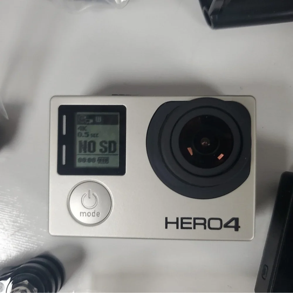 GoPro Hero4, Two Batteries, And Accessories Lot. Mounts, Body And Head Harness
